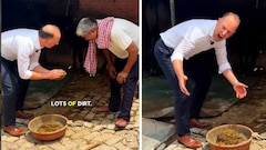 भारत के गांव घूमने पहुंचे जर्मन डिप्लोमैट ने उठाया गोबर, कहा- खेती-बाड़ी की जिंदगी आसान नहीं है