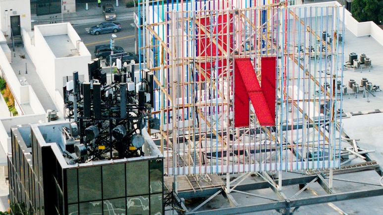 Netflix Shares Slide On Slower Growth Forecast, Programming Woes