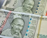 India's Record Bank Cash Surplus Fades As RBI Curbs Rupee Bets
