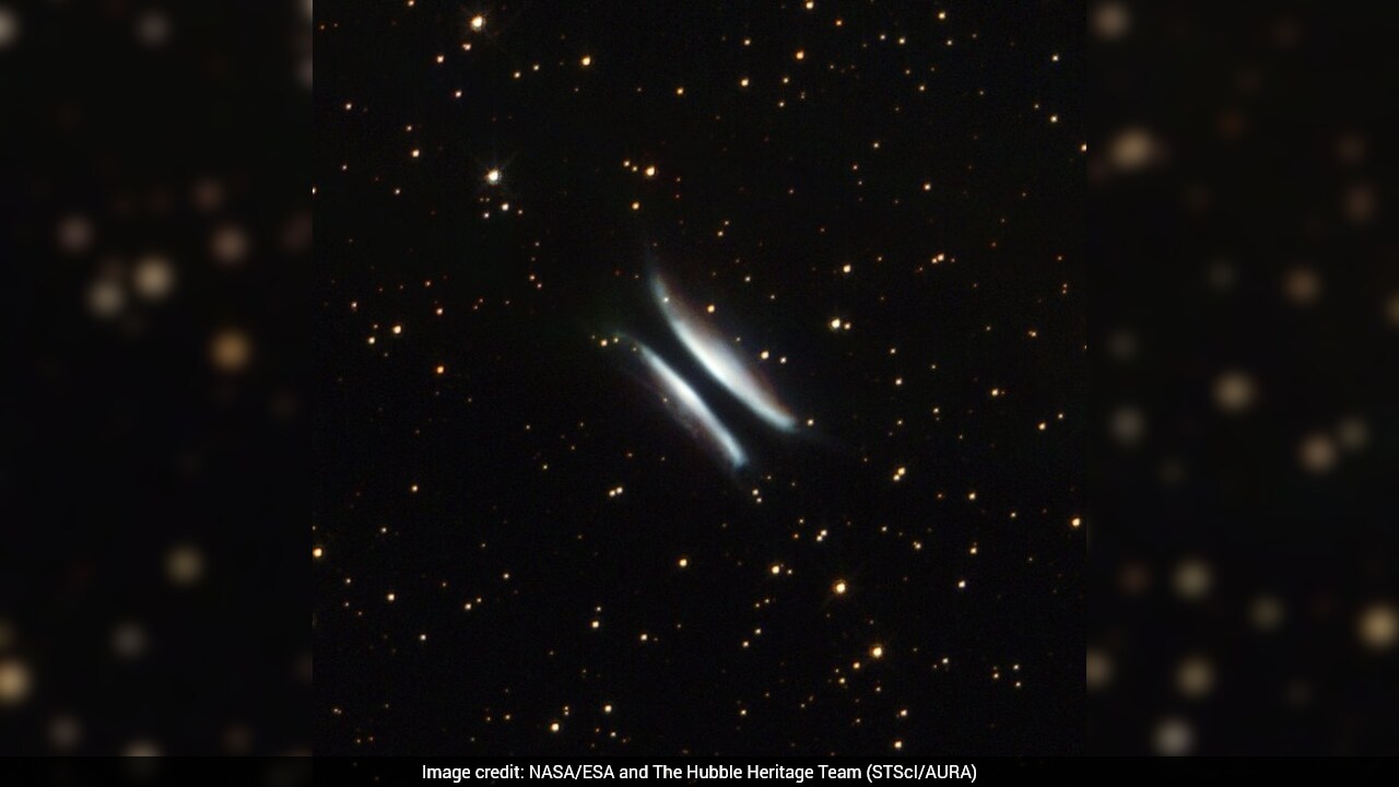 Cosmic 'Hamburger' Offers Rare Side-On View Of Planet Birth
