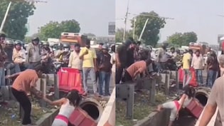 Foreign Woman Spotted Walking Inside Roadside Drain Near Delhi's Mahipalpur