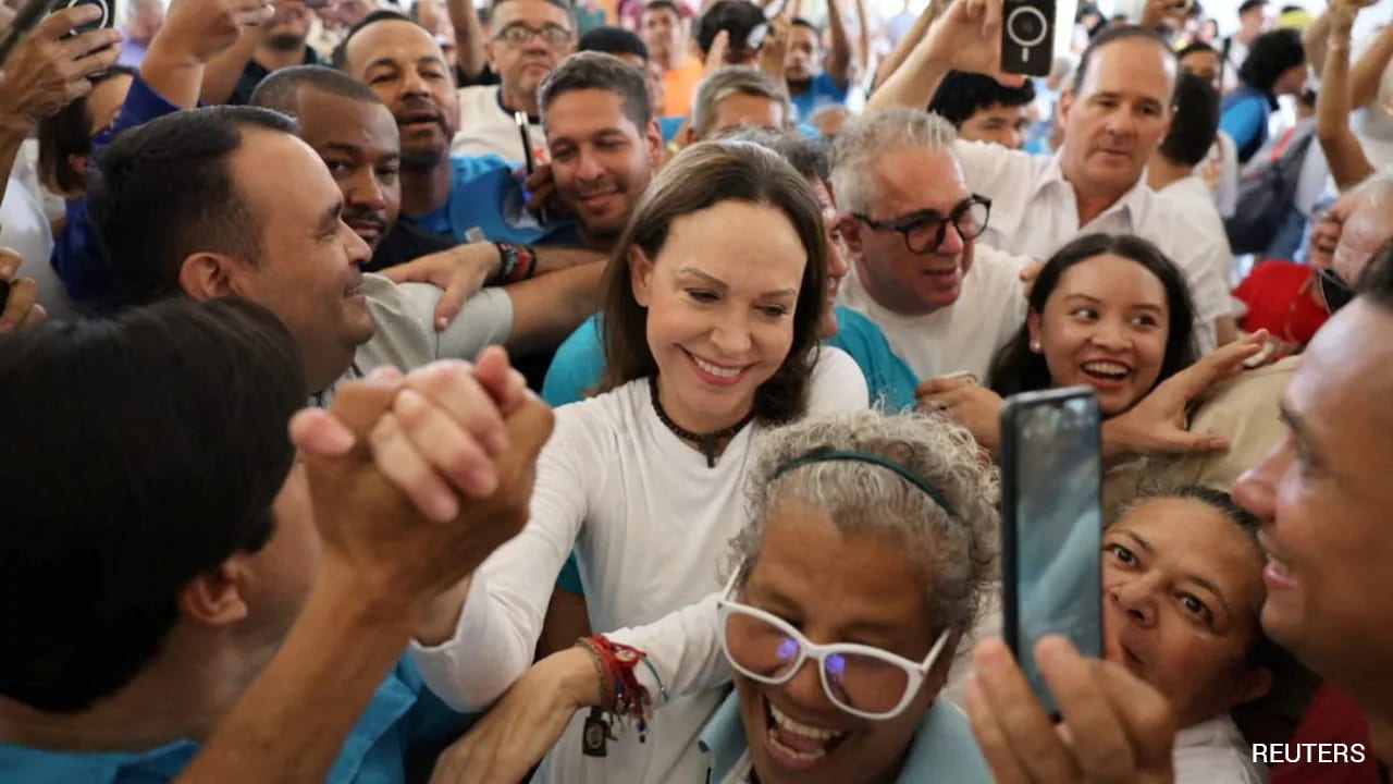 "I'm Here, With You": Venezuela Opposition Leader Machado Returns To Caracas