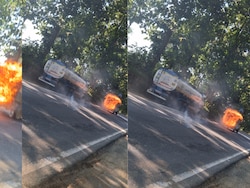 Video: Vehicle With Firewood Catches Fire, Speeds Down Road In Assam