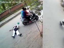 On Camera, Woman Dragged On Road During Bag-Snatching Attempt