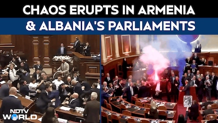 Parliament Chaos In Armenia, Albania: MPs Throw Punches, Opposition Fires Flares