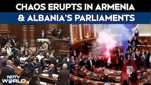 Parliament Chaos In Armenia, Albania: MPs Throw Punches, Opposition Fires Flares