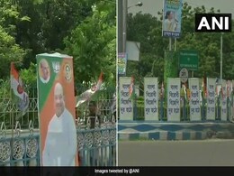कोलकाता में अमित शाह की रैली से पहले बीजेपी और टीएमसी में 'पोस्टर वार' कोलकाता में अमित शाह की रैली से पहले बीजेपी और टीएमसी में 'पोस्टर वार'