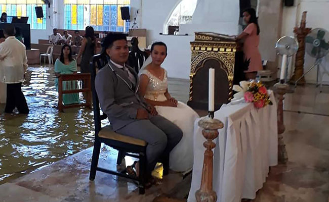 Monsoon Wedding: Bride Wins Hearts By Walking Down Flooded Church Aisle