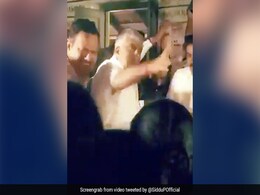 Minister Throws Biscuits At Flood Victims, HD Kumaraswamy Backs Him Minister Throws Biscuits At Flood Victims, HD Kumaraswamy Backs Him