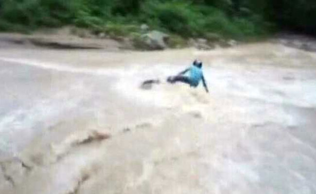 Overflowing River, 'Daring' Biker. It Didn't Go His Way. Watch His Rescue