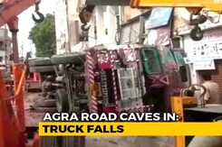Man Crushed Under Truck, Woman Saved After Road Gives Away In Agra Man Crushed Under Truck, Woman Saved After Road Gives Away In Agra
