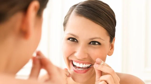 Flossing can help get rid of food particle stuck in between your teeth