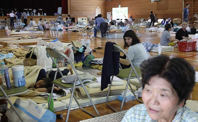 Forced From Home By Floods, Japanese Go Back To School