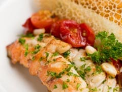 Risotto Lobster with Parmesan Egg Pancake, Confit Tomatoes and Coral Tuille