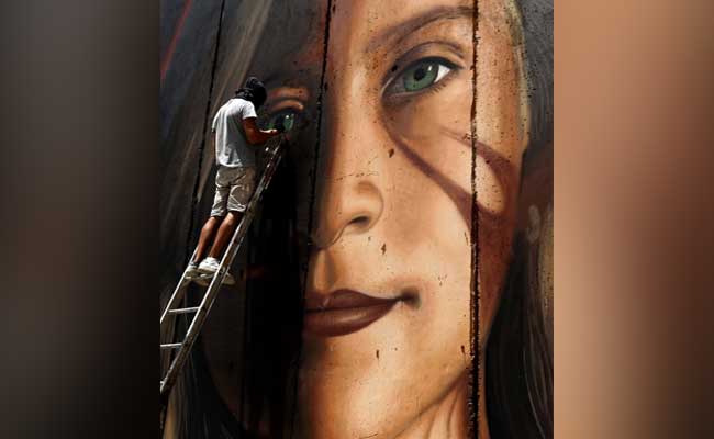 2 Italians In Israel Arrested For Painting Mural Of Palestinian Teen