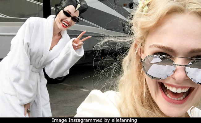 Angelina Jolie Joins <i>Maleficent 2</I> Sets And Then Photobombs Elle Fanning