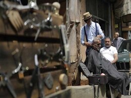 Beirut's Barber-On-A-Bike Offers Curbside Cuts Beirut's Barber-On-A-Bike Offers Curbside Cuts