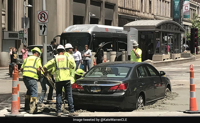 Driver Gets Car Stuck In Wet Cement, Pics End Up On Twitter