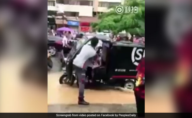 Delivery Man Helps Children Stranded On Flooded Road, Wins Hearts. Watch