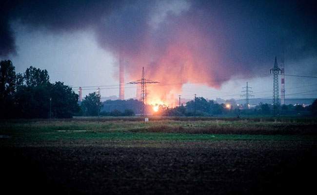Eight Injured, Thousands Evacuated After Blast, Fire At German Refinery