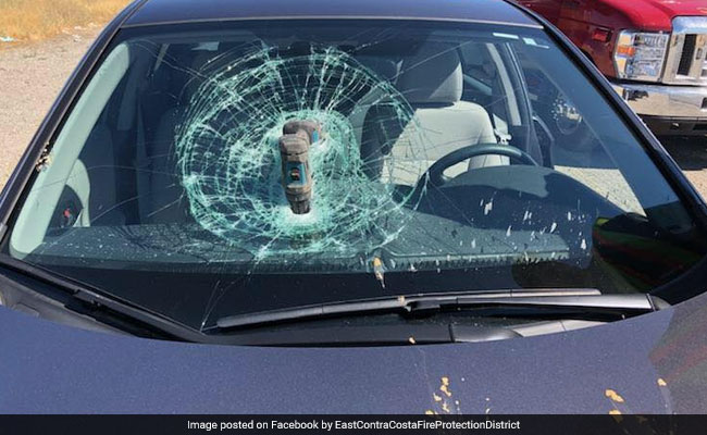 Drill Machine Falls Out Of Vehicle, Smashes Into Windshield Of Moving Car