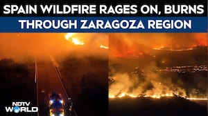 Firefighters Struggle To Control Huge Zaragoza Wildfire In Shifting Winds