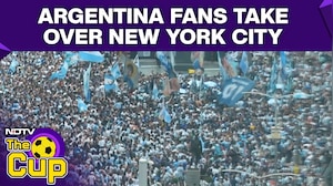 Argentina Fans Take Over Times Square Ahead Of FIFA World Cup Final