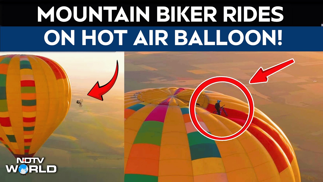 Hot Balloon Ride | Cyclist Becomes First to Ride On Top of Hot Air Balloon Before Jumping Off