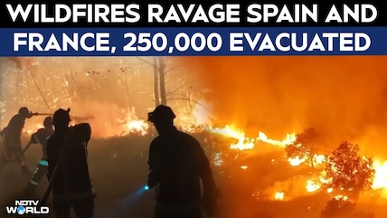 Thousands Evacuated From Massive Wildfires In Spain And France