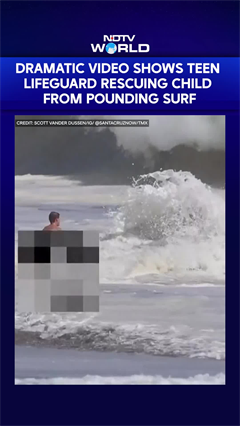 Dramatic Footage Shows Teen Lifeguard Saving A Child From Pounding Surf
