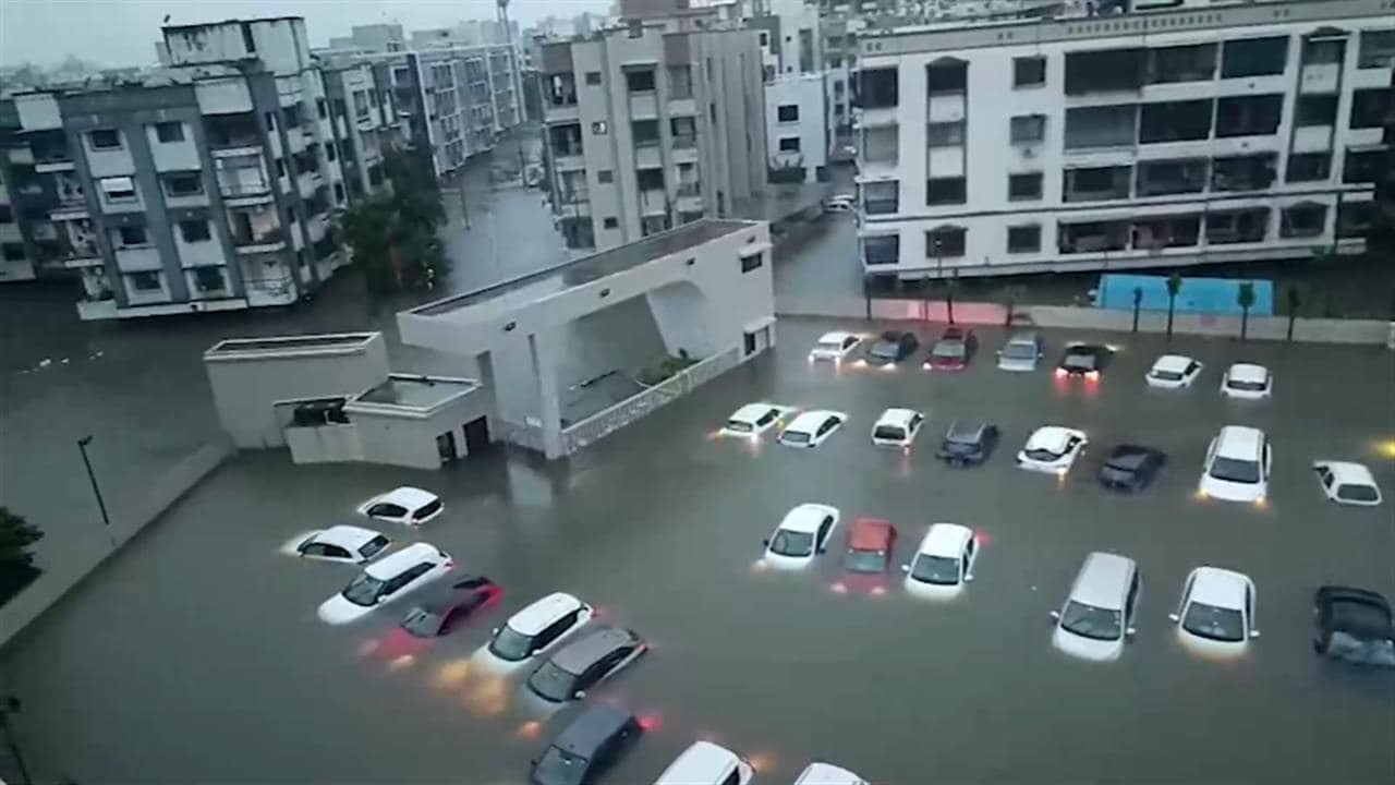Over 50 Cars Submerged As Rain Floods Parking Lot In Gujarat's Valsad
