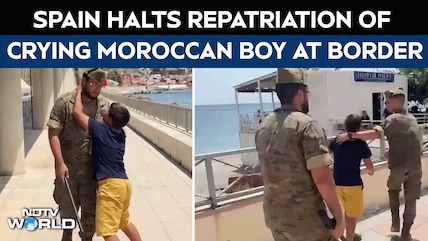 Spain Soldiers Escort Crying Moroccan Boy To Border Before Repatriation Halted