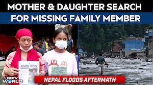 Mother & Daughter Search For Their Missing Family Member Days After Nepal Floods