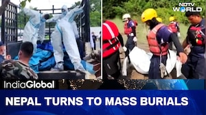 Nepal Starts Burial Of Flooding Victims In Temporary Graves