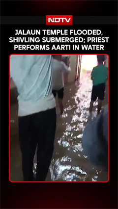 Jalaun Temple Flooded, Shivling Submerged; Priest Performs Aarti In Water