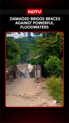 Nepal Floods | Damaged Bridge Braces Against Powerful Floodwaters