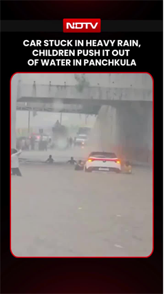Car Stuck In Heavy Rain, Children Push It Out Of Water In Panchkula