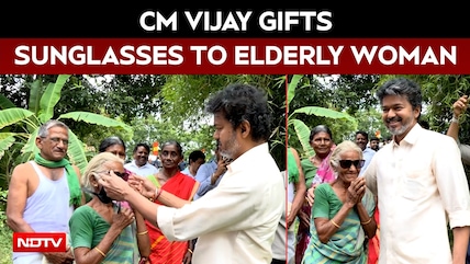 CM Vijay Gifts Sunglasses To Elderly Woman In Mettur