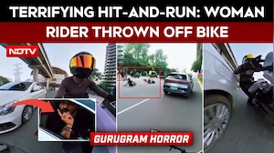 Gurugram Biker News | Terrifying Encounter: Car Hits Woman Biker, Drags Bike In Gurugram