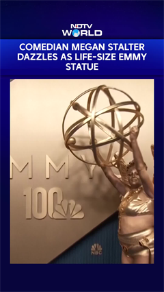 Comedian Megan Stalter Dazzles As Life-Size Emmy Statue