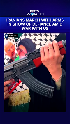 Hundreds Of Iranians March While Carrying Arms In Show Of Defiance Amidst US War