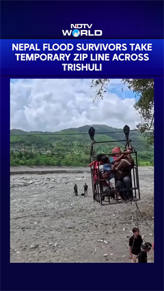 Cut Off By Nepal Floods, People Turn To Army-Built Cable Lifeline To Cross Trishuli