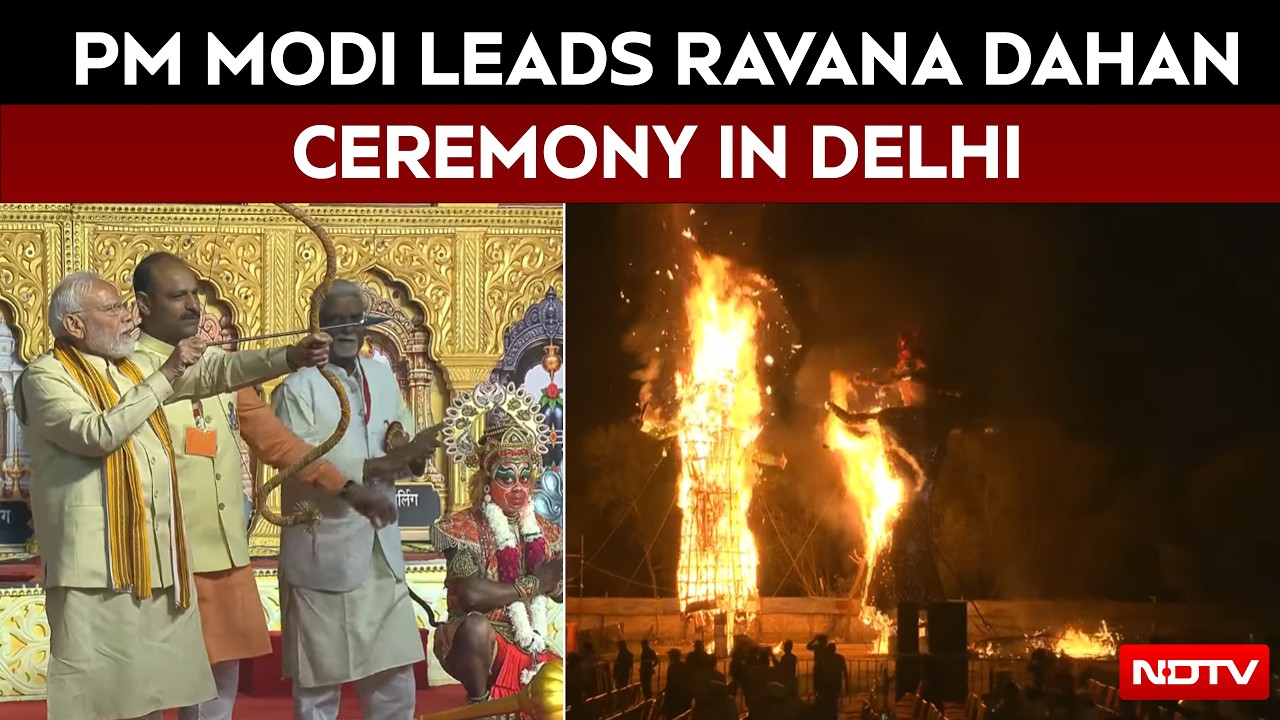 PM Modi Fires Arrow At Ravana Effigy During Grand Dussehra Celebrations In Delhi
