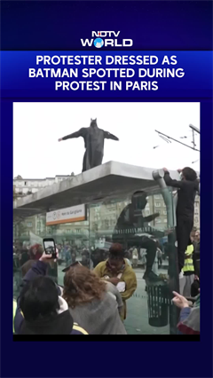 Batman Joins France Protests? Cost-Of-Living Rally Gets A Superhero Twist In Paris