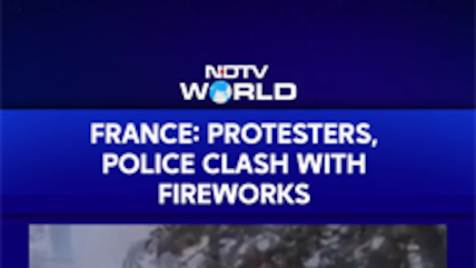 Protesters And Police Clash With Fireworks, Tear Gas Across France