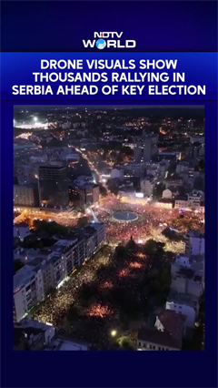 Thousands Rally In Serbia Ahead Of Key Election, Drone Visuals Show Massive Crowds