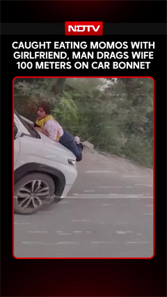 Woman Catches Husband Eating Momo With Girlfriend, He Drags Her On Car Bonnet