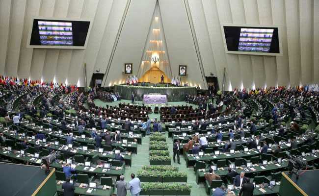 Iran Lawmakers Target Hassan Rouhani's Finance Minister As Sanctions Bite