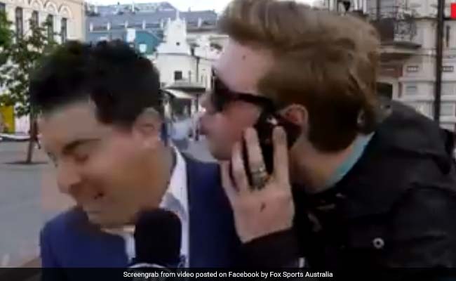 Fan Gets Too Close For Comfort To Reporter On Live TV. Watch Awkward Moment