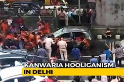 Watch: Kanwar Pilgrims Smash, Topple Car That Brushed Them In Delhi Watch: Kanwar Pilgrims Smash, Topple Car That Brushed Them In Delhi